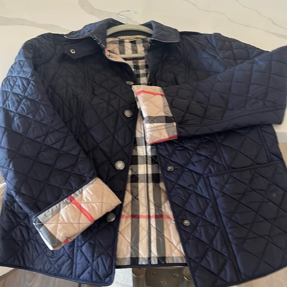 Burberry Navy quilted jacket.